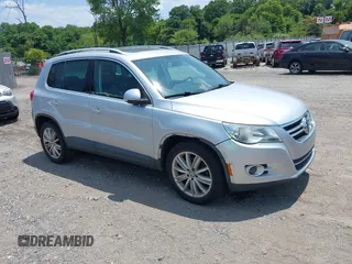 2011 Volkswagen Tiguan SE with VIN WVGAV7AX7BW568624, listed as a IAAI auction lot 42691978 with 137,340 mi miles and . Bid and sale history available at DreamBid. Image 1.