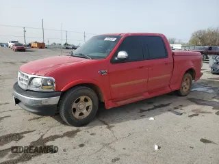 2001 Ford F-150 XLT with VIN 1FTRW07L41KF97200, listed as a Copart auction lot 51093245 with 227,310 mi miles and Salvage title. Bid and sale history available at DreamBid. Image 1.
