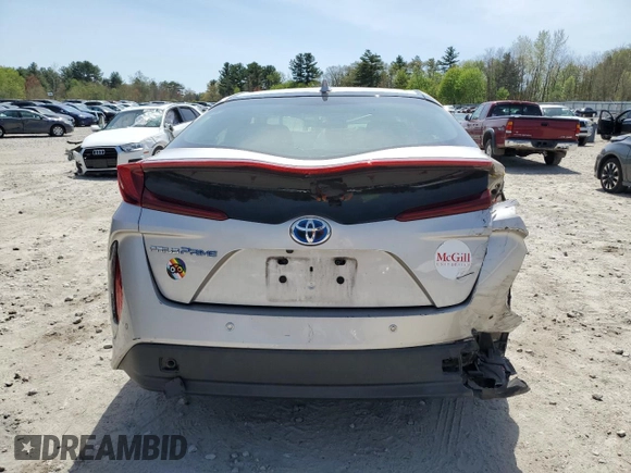 2017 Toyota Prius Plus z VIN JTDKARFP8H3049875, wystawiony jako Copart lot #54362185 z przebiegiem 81 193 mil mil oraz Szkoda całkowita • Salvage title. Historia ofert i sprzedaży dostępna na DreamBid. Obrazek 6.