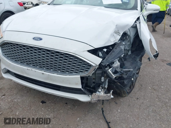 2020 Ford Fusion Titanium с VIN 3FA6P0D98LR151810, выставлен на аукционе IAAI как лот 42590902 с пробегом 76 624 миль миль и . История ставок и продаж доступна на DreamBid. Изображение 6.