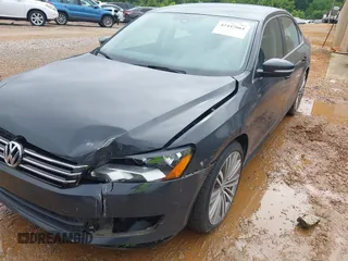 2014 Volkswagen Passat SE z VIN 1VWBT7A39EC097705, wystawiony jako IAAI lot #42447661 z przebiegiem 72 607 mil mil oraz . Historia ofert i sprzedaży dostępna na DreamBid. Obrazek 12.