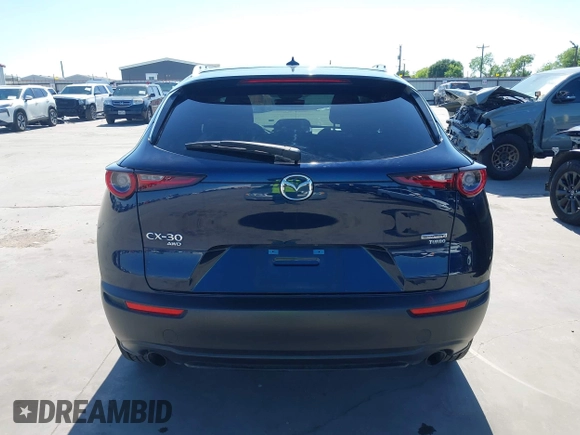 2021 Mazda CX-30 Premium with VIN 3MVDMBDYXMM307047, listed as a IAAI auction lot 41974966 with 53,409 mi miles and . Bid and sale history available at carsss.com. Image 17.