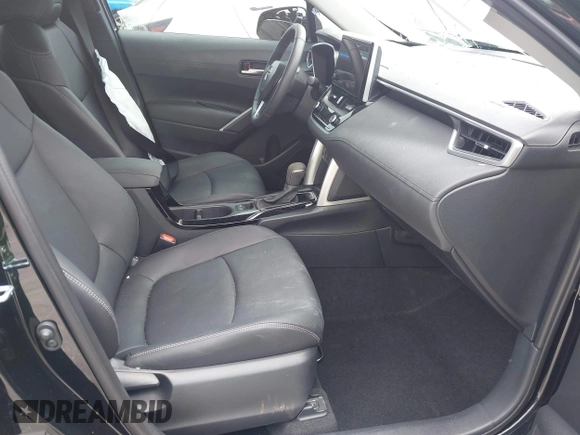 2024 Toyota Corolla Cross XLE with VIN 7MUEAABG8RV084586, listed as a IAAI auction lot 42211214 with 16,316 mi miles and . Bid and sale history available at DreamBid. Image 5.