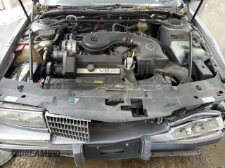 1991 Cadillac Seville z VIN 1G6KS53B2MU809384, wystawiony jako Copart lot #77185134 z przebiegiem 134 769 mil mil oraz Szkody całkowita. Historia ofert i sprzedaży dostępna na DreamBid. Obrazek 11.