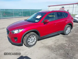 2016 Mazda CX-5 Touring with VIN JM3KE4CY5G0816285, listed as a IAAI auction lot 41888537 with 101,598 mi miles. Bid and sale history available at carsss.com. Image 2.