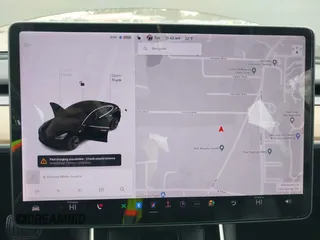 2019 Tesla Model 3 Mid Range with VIN 5YJ3E1EA5KF297213, listed as a IAAI auction lot 41361412 with 93,801 mi miles and . Bid and sale history available at carsss.com. Image 7.