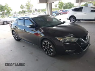 2016 Nissan Maxima SV with VIN 1N4AA6AP5GC413563, listed as a IAAI auction lot 42196144 with 209,711 mi miles and . Bid and sale history available at DreamBid. Image 14.