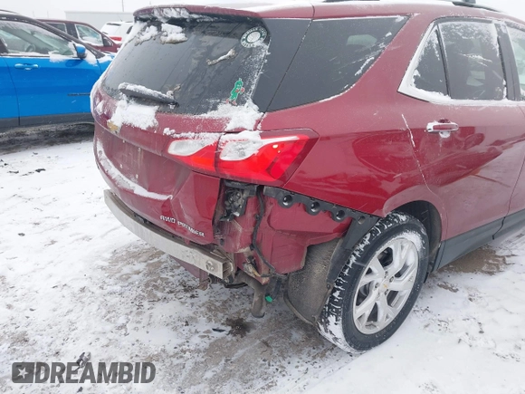 2021 Chevrolet Equinox Premier z VIN 2GNAXXEV4M6105996, wystawiony jako IAAI lot #41402065 z przebiegiem 51 083 mil mil oraz . Historia ofert i sprzedaży dostępna na DreamBid. Obrazek 18.