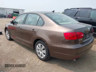 2014 Volkswagen Jetta SE with VIN 3VWD07AJ7EM251973, listed as a IAAI auction lot 42415573 with 124,323 mi miles and . Bid and sale history available at DreamBid. Image 3.