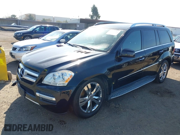 2012 Mercedes-Benz GL 450 with VIN 4JGBF7BE8CA764780, listed as a IAAI auction lot 41830382 with 131,498 mi miles and . Bid and sale history available at DreamBid. Image 6.