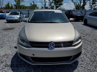 2013 Volkswagen Jetta SE z VIN 3VWDX7AJXDM235339, wystawiony jako Copart lot #52751345 z przebiegiem 143 478 mil mil oraz Szkoda całkowita • Salvage title. Historia ofert i sprzedaży dostępna na DreamBid. Obrazek 5.