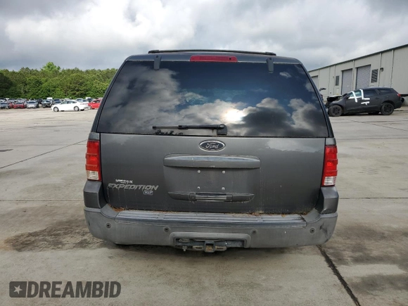 2004 Ford Expedition Special Service with VIN 1FMFU16L54LA95354, listed as a Copart auction lot 57027115 with 176,243 mi miles and Salvage title. Bid and sale history available at DreamBid. Image 6.
