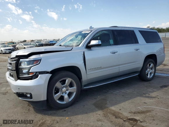 2020 Chevrolet Suburban Premier with VIN 1GNSCJKC0LR216855, listed as a Copart auction lot 72287114 with 94,642 mi miles and Salvage Title. Bid and sale history available at carsss.com. Image 1.