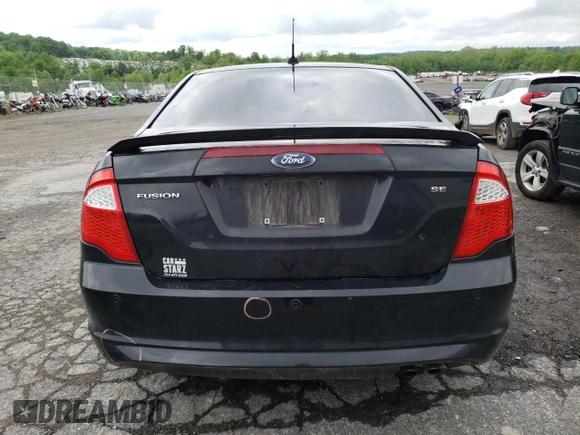 2012 Ford Fusion SE z VIN 3FAHP0HA6CR359083, wystawiony jako Copart lot #56463515 z przebiegiem 135 730 mil mil oraz Szkoda całkowita • Salvage title. Historia ofert i sprzedaży dostępna na DreamBid. Obrazek 6.