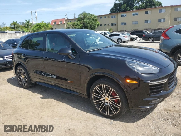 2017 Porsche Cayenne GTS with VIN WP1AD2A29HLA81318, listed as a Copart auction lot 59517413 with 77,363 mi miles and . Bid and sale history available at DreamBid. Image 4.