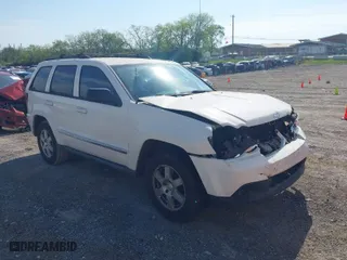 2010 Jeep Grand Cherokee Laredo with VIN 1J4PS4GK6AC112447, listed as a IAAI auction lot 42086245 with 150,875 mi miles. Bid and sale history available at carsss.com. Image 1.