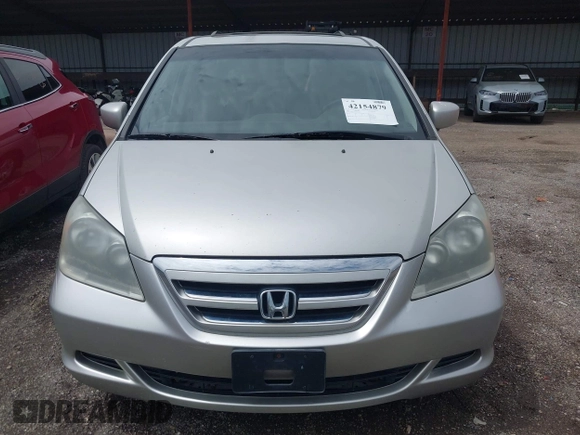 2007 Honda Odyssey EX-L with VIN 5FNRL38767B455948, listed as a IAAI auction lot 42154879 with 232,645 mi miles and . Bid and sale history available at DreamBid. Image 6.