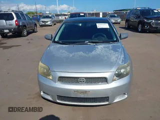 2006 Scion tC with VIN JTKDE177X60088987, listed as a IAAI auction lot 41893922 with 153,282 mi miles. Bid and sale history available at carsss.com. Image 6.