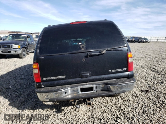 2002 Chevrolet Suburban LT with VIN 1GNFK16T02J261631, listed as a Copart auction lot 46933875 with Not provided miles and Salvage title. Bid and sale history available at DreamBid. Image 6.