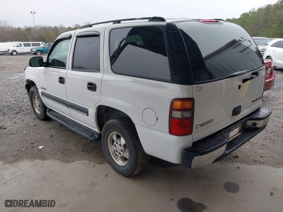 2003 Chevrolet Tahoe LT with VIN 1GNEC13Z63J126611, listed as a IAAI auction lot 41300437 with 313,885 mi miles. Bid and sale history available at carsss.com. Image 3.