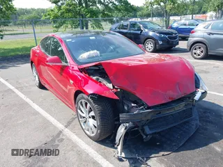 2016 Tesla Model S 90D z VIN 5YJSA1E4XGF171244, wystawiony jako IAAI lot #42584589 z przebiegiem 85 412 mil mil oraz . Historia ofert i sprzedaży dostępna na DreamBid. Obrazek 1.