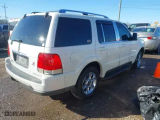 2004 Lincoln Aviator Luxury with VIN 5LMEU68H24ZJ49589, listed as a IAAI auction lot 41608691 with 211,635 mi miles. Bid and sale history available at carsss.com. Image 4.