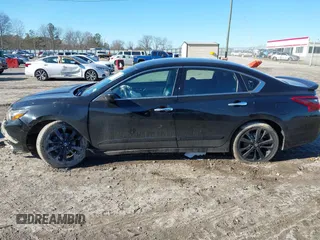 2017 Nissan Altima SV with VIN 1N4AL3APXHC217113, listed as a IAAI auction lot 41371669 with 109,897 mi miles and . Bid and sale history available at DreamBid. Image 14.