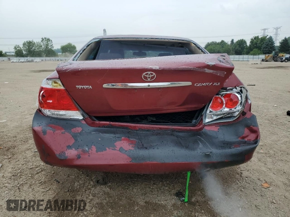 2005 Toyota Camry LE with VIN 4T1BE30KX5U086586, listed as a Copart auction lot 60291715 with 180,421 mi miles and Salvage title. Bid and sale history available at DreamBid. Image 6.