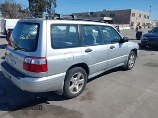 2002 Subaru Forester S w/Premium Pkg with VIN JF1SF65602H727253, listed as a IAAI auction lot 41678044 with 314,643 mi miles. Bid and sale history available at carsss.com. Image 4.