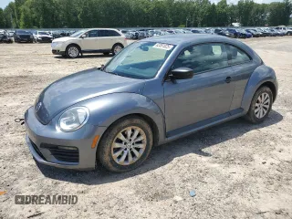 2017 Volkswagen Beetle Fleet with VIN 3VWF17AT5HM627629, listed as a Copart auction lot 62061025 with 106,866 mi miles and Salvage title. Bid and sale history available at DreamBid. Image 1.
