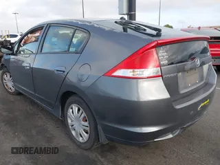 2010 Honda Insight LX with VIN JHMZE2H5XAS038974, listed as a IAAI auction lot 41958346 with Not provided miles and . Bid and sale history available at DreamBid. Image 3.