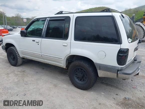 1999 Ford Explorer XLT z VIN 1FMZU34E1XZA39121, wystawiony jako IAAI lot #42107728 z przebiegiem 194 374 mil mil oraz . Historia ofert i sprzedaży dostępna na DreamBid. Obrazek 3.