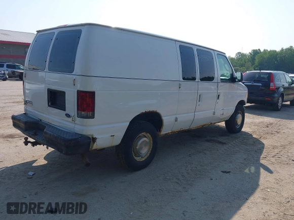 2006 Ford Econoline Cargo with VIN 1FTSE34L66HA34423, listed as a IAAI auction lot 42441829 with 305,406 mi miles and . Bid and sale history available at DreamBid. Image 4.