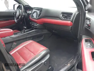 2021 Dodge Durango R/T with VIN 1C4SDHCT5MC660105, listed as a IAAI auction lot 42373172 with 75,227 mi miles and . Bid and sale history available at DreamBid. Image 5.