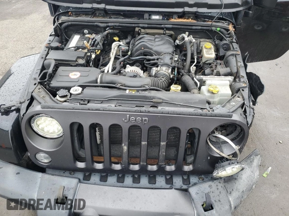 2017 Jeep Wrangler Sport z VIN 1C4AJWAG4HL563093, wystawiony jako Copart lot #51603125 z przebiegiem 105 618 mil mil oraz Szkoda całkowita • Salvage title. Historia ofert i sprzedaży dostępna na DreamBid. Obrazek 12.
