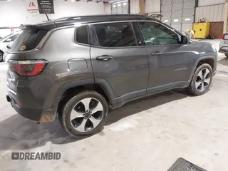 2018 Jeep Compass Latitude with VIN 3C4NJDBB9JT116391, listed as a IAAI auction lot 41953729 with 129,331 mi miles and . Bid and sale history available at DreamBid. Image 4.
