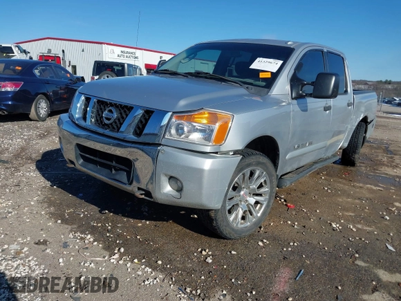 2011 Nissan Titan Pro-4X with VIN 1N6BA0EC8BN304544, listed as a IAAI auction lot 41329674 with 235,319 mi miles and . Bid and sale history available at DreamBid. Image 2.