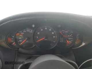 1999 Porsche 911 z VIN WP0AA299XXS623462, wystawiony jako Copart lot #85549554 z przebiegiem Nie podano mil oraz Szkoda całkowita • Salvage title. Historia ofert i sprzedaży dostępna na DreamBid. Obrazek 9.