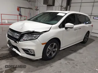 2019 Honda Odyssey Touring with VIN 5FNRL6H83KB051363, listed as a IAAI auction lot 41173587 with 88,512 mi miles. Bid and sale history available at carsss.com. Image 16.