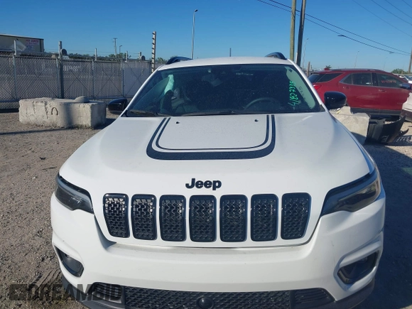 2022 Jeep Cherokee X with VIN 1C4PJMCX2ND533284, listed as a IAAI auction lot 41827335 with 19,404 mi miles. Bid and sale history available at carsss.com. Image 13.