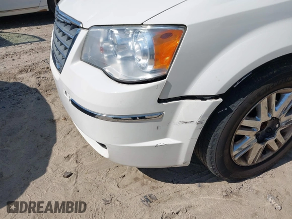 2010 Chrysler Town & Country Limited with VIN 2A4RR7DX2AR322525, listed as a IAAI auction lot 42194994 with 180,727 mi miles and . Bid and sale history available at carsss.com. Image 6.