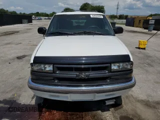 1999 Chevrolet Blazer LS с VIN 1GNCS13W6X2217684, выставлен на аукционе Copart как лот 63035645 с пробегом 114 567 миль миль и Списание • Salvage title. История ставок и продаж доступна на DreamBid. Изображение 5.