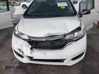 2018 Honda Fit LX with VIN 3HGGK5H49JM734620, listed as a IAAI auction lot 41984212 with 106,427 mi miles. Bid and sale history available at carsss.com. Image 6.