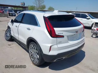 2024 Cadillac XT4 AWD Premium Luxury with VIN 1GYFZDR40RF100102, listed as a IAAI auction lot 41987175 with 4,935 mi miles and . Bid and sale history available at DreamBid. Image 3.