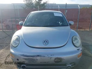 2003 Volkswagen New Beetle Coupe GLS with VIN 3VWCK21C53M418371, listed as a IAAI auction lot 41479358 with 148,867 mi miles. Bid and sale history available at carsss.com. Image 6.