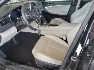 2023 Genesis G70 2.0T z VIN KMTG34TA1PU132593, wystawiony jako Copart lot #49231195 z przebiegiem 36 246 mil mil oraz Szkody całkowita. Historia ofert i sprzedaży dostępna na DreamBid. Obrazek 7.