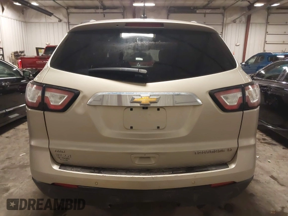 2016 Chevrolet Traverse LT with VIN 1GNKVGKD5GJ267827, listed as a IAAI auction lot 41962344 with 206,806 mi miles and . Bid and sale history available at DreamBid. Image 17.