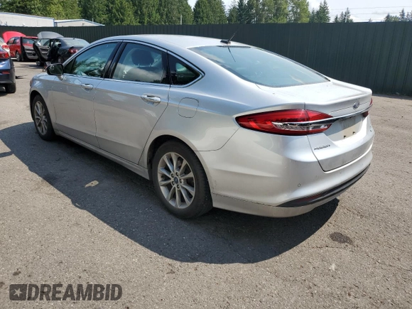 2017 Ford Fusion SE with VIN 3FA6P0HD4HR187841, listed as a Copart auction lot 61766415 with 74,303 mi miles and Salvage title. Bid and sale history available at DreamBid. Image 2.