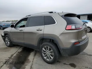 2021 Jeep Cherokee Altitude with VIN 1C4PJLLB3MD169129, listed as a Copart auction lot 82715734 with 59,468 mi miles and Salvage Title. Bid and sale history available at carsss.com. Image 2.