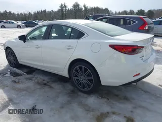 2016 Mazda 6 i Grand Touring с VIN JM1GJ1W55G1468475, выставлен на аукционе IAAI как лот 41651004 с пробегом 31 332 миль миль и . История ставок и продаж доступна на DreamBid. Изображение 3.